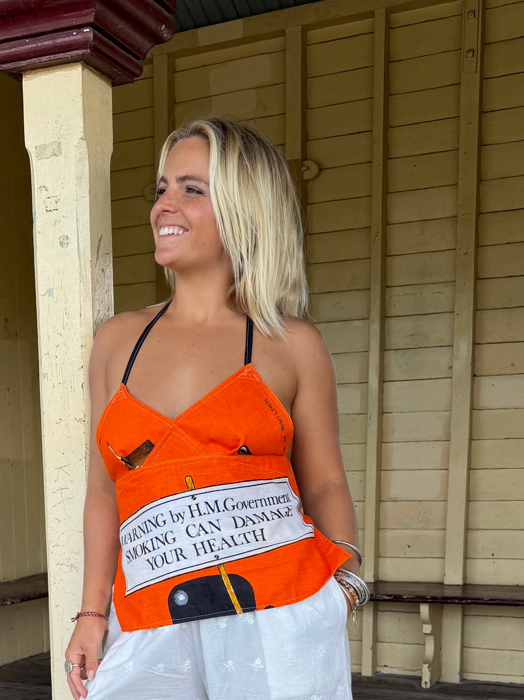 Vintage linen tea towel halter neck top. “Smoking Warning” Size 8-18.