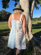 Powder Blue Vintage Upcycled Pinafore with Bluebell floral detail back view